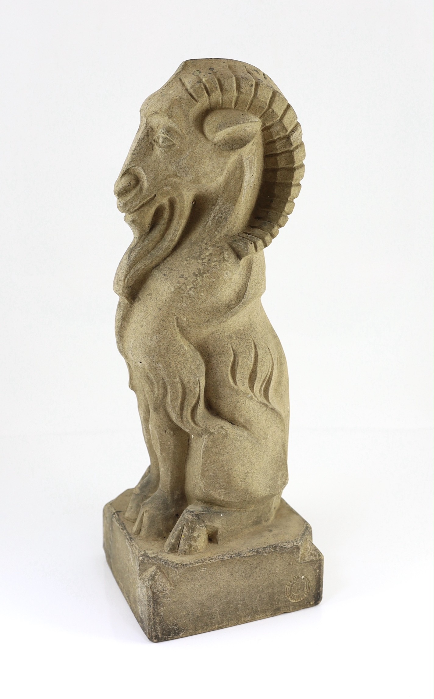 A Doulton Lambeth stoneware garden figure of a seated goat, designed by Francis Pope, early 20th century, 51cm high